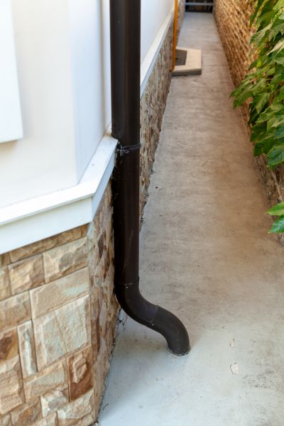 Cost of Underground Gutter Service in Warren