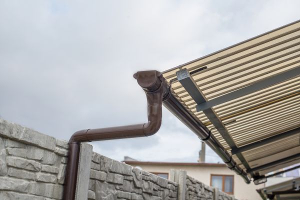 Plastic Downspout Installation in Warren